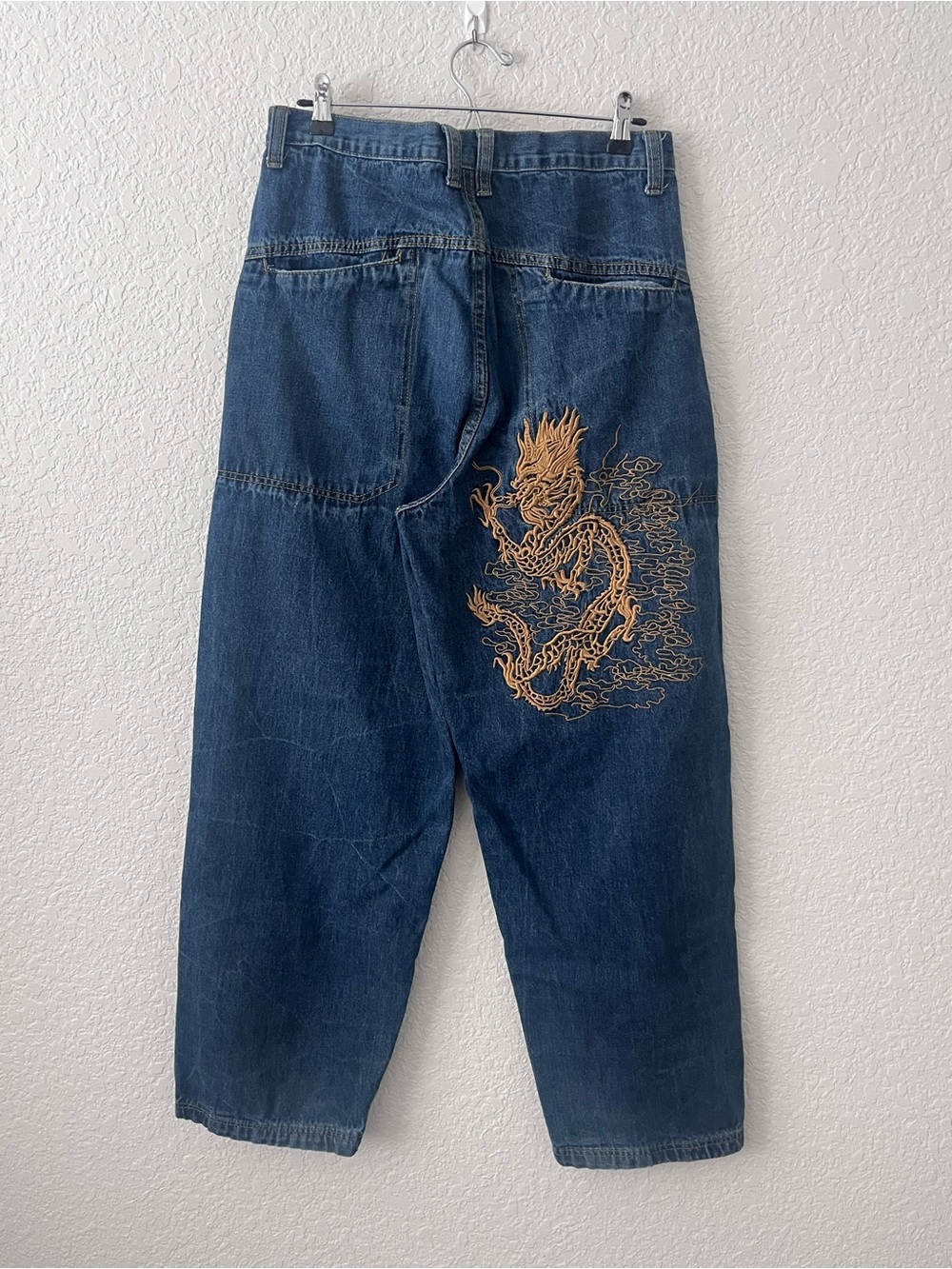 Relaxed Fit Dark Blue Denim Jeans with a gold Dragon embroidered